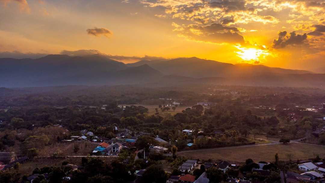 The sun is setting over a small town