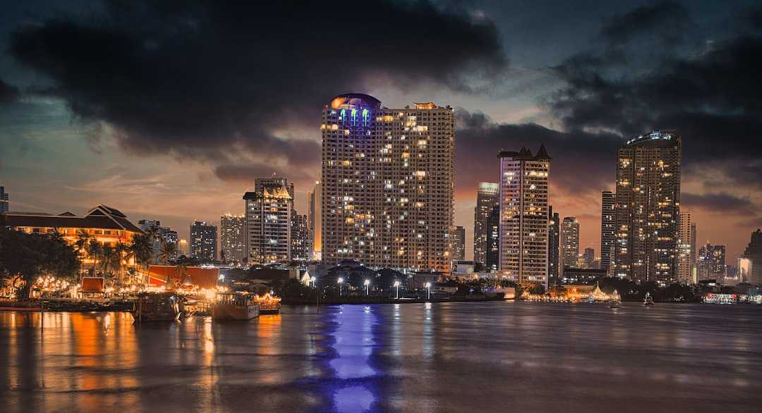 A view of a city at night from across the water